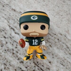 Green and Yellow Football Figure